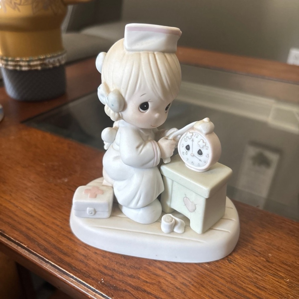 Precious Moments Nurse Figurine - White and Cream